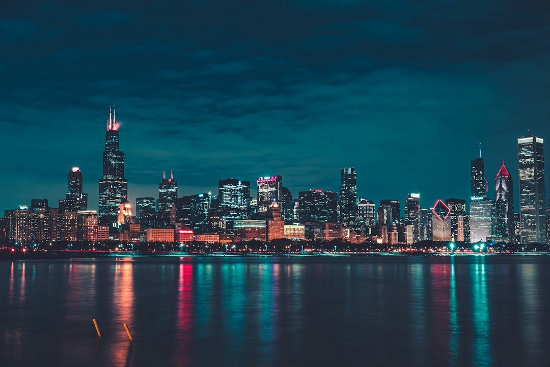 The Chicago skyline lit up at night, the traditional home of CAPCon