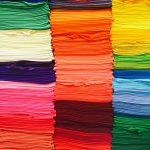 Folded fabric in pink, green, blue and yellow