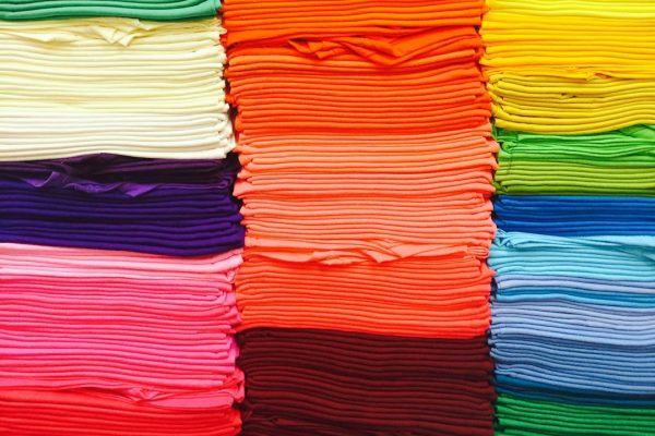 Folded fabric in pink, green, blue and yellow