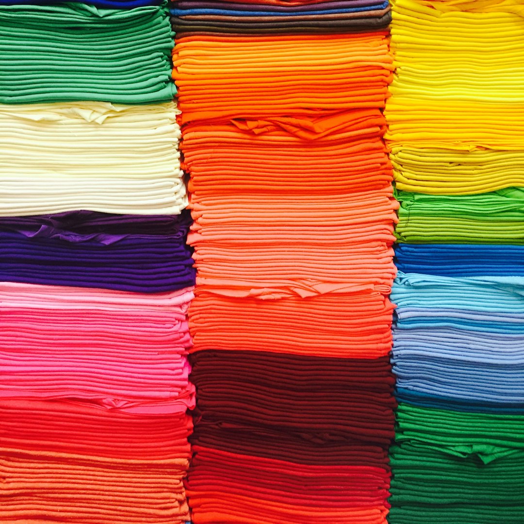 Folded fabric in pink, green, blue and yellow