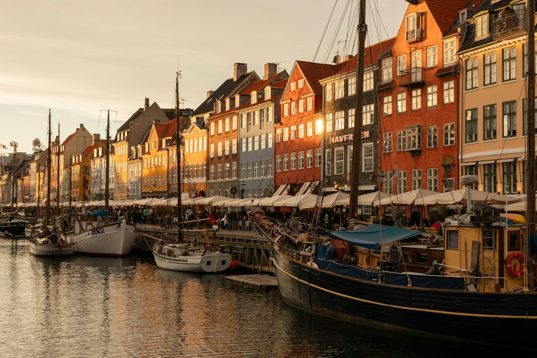 Colorful waterfront houses and boats at Nyhavn in Copenhagen, Denmark