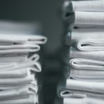 Stacked gray plastic-wrapped packs