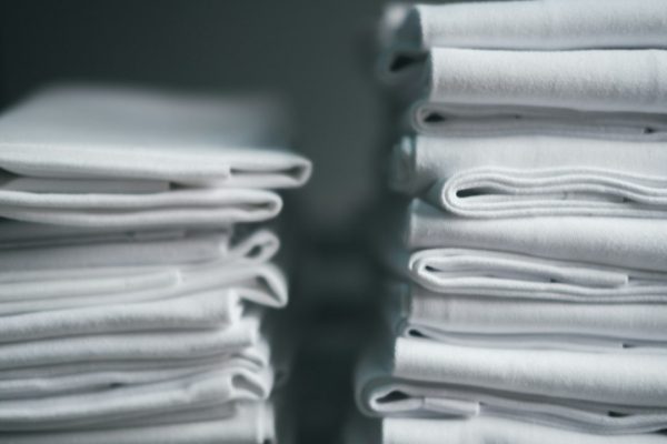 Stacked gray plastic-wrapped packs