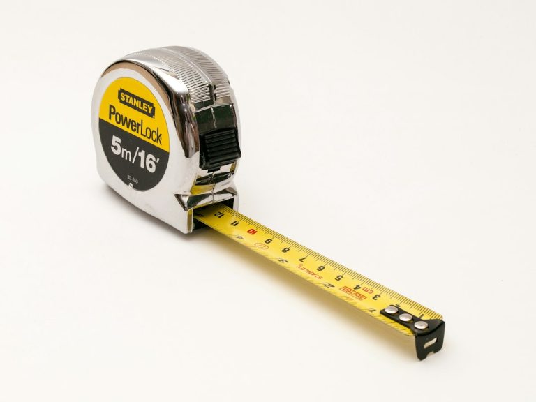 A tape measure ready for taking waist and hip measurements